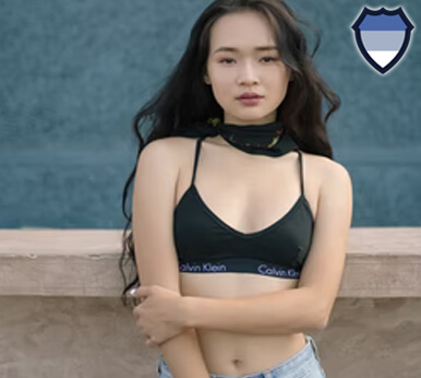 Asian lady wearing a sports bra