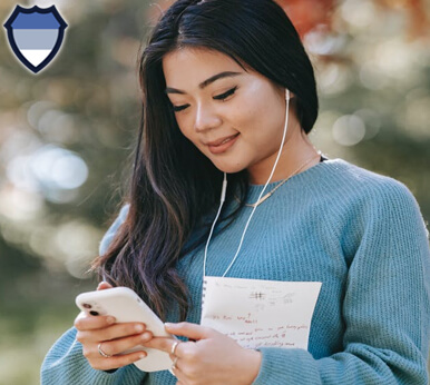 Asian woman looking at her phone